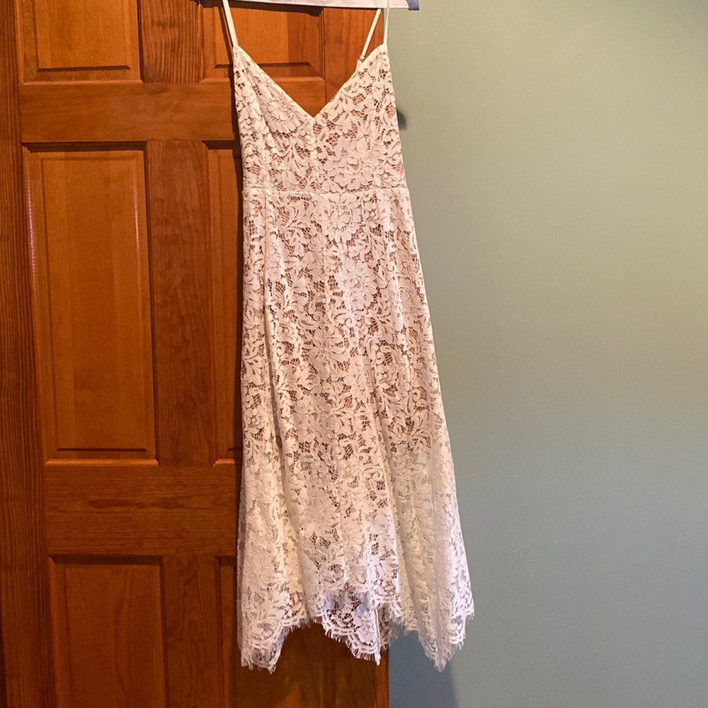 White lace dress with cream underlay